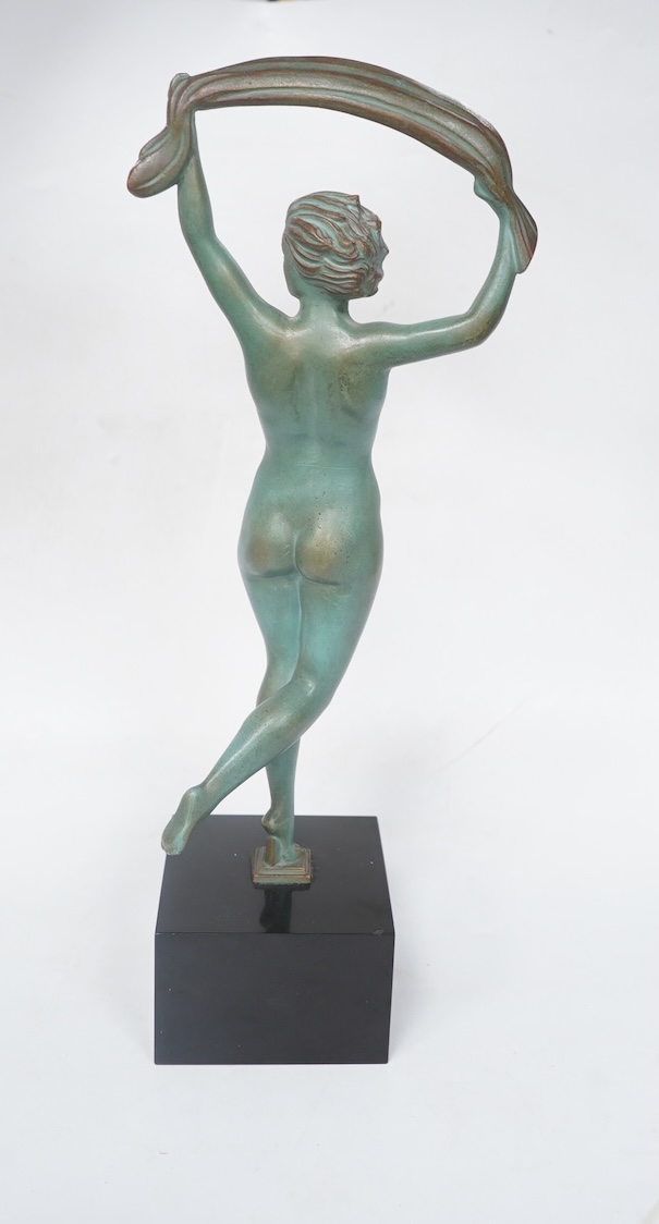 A French Art Deco bronze model of a dancer, green patination, on black marble base. 33cm high. Condition - minor chip to base